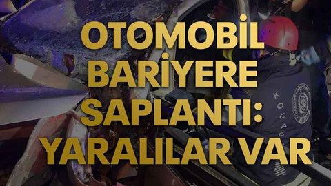 Otomobil bariyere saplantı: Yaralılar var